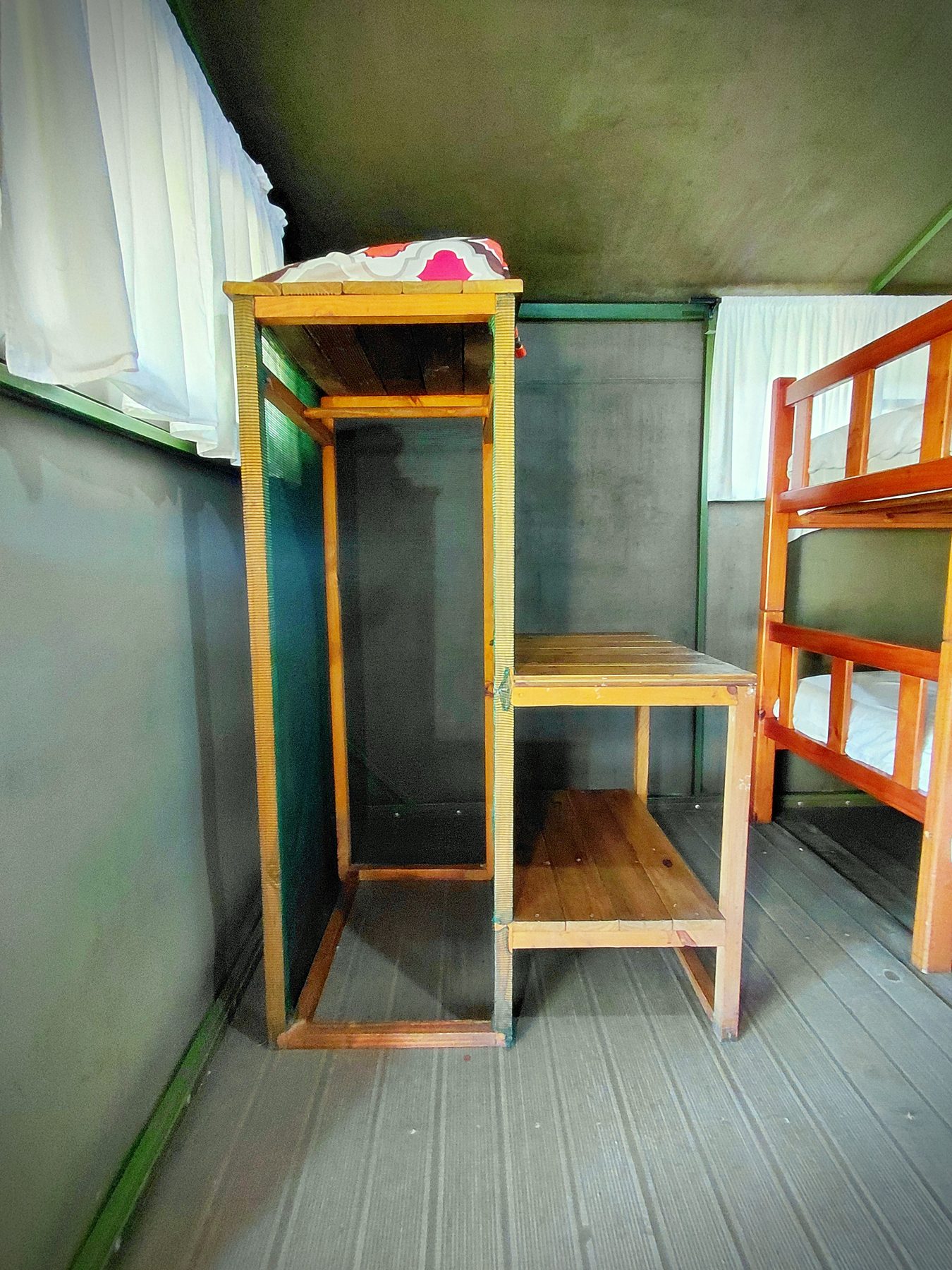 Storage space and shelving inside the four sleeper tent